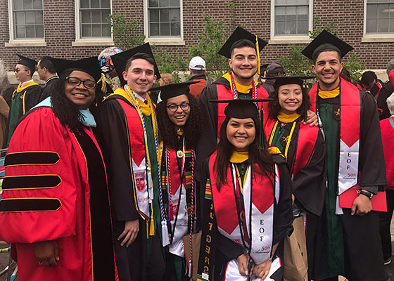 SEBS EOF students and Dean Sabb pose for a picture at the 2018 Convocation ceremony