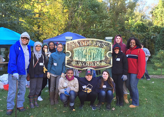 SEBS EOF students gather for a picture at Saddler's Woods